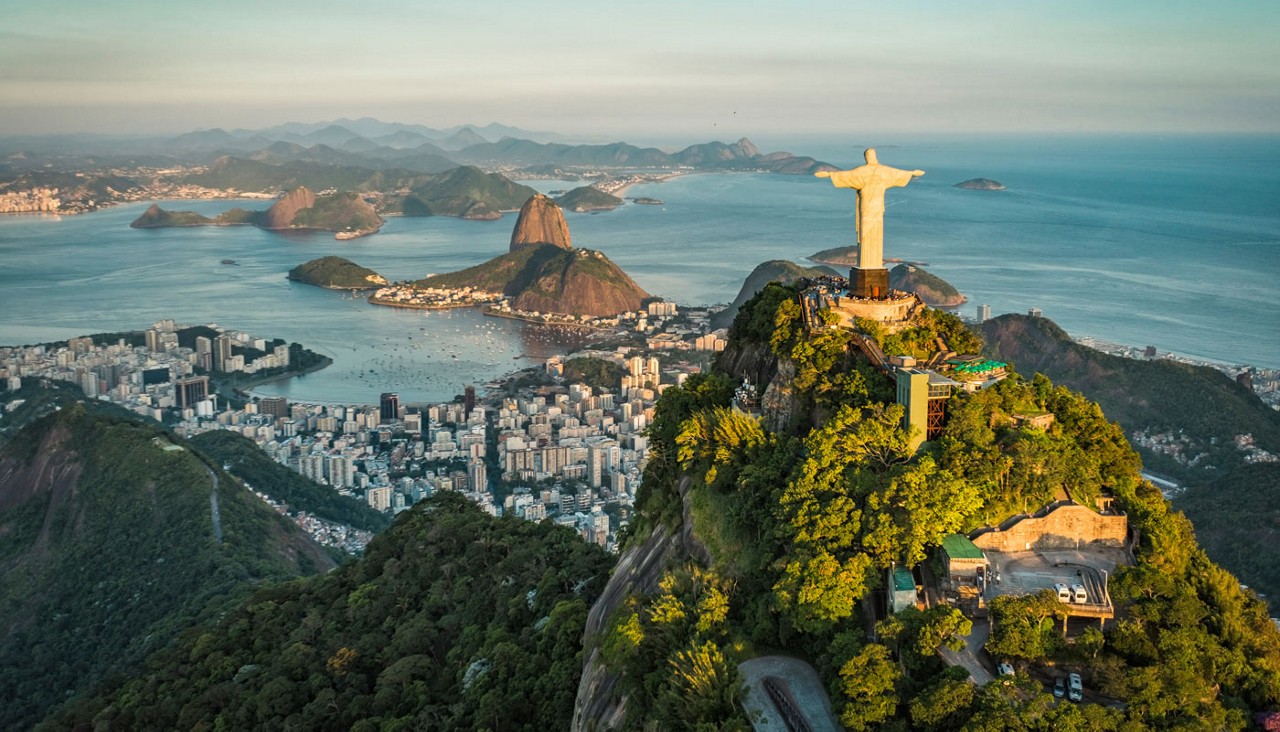Aerial view of Christ and Botafogo Bay from high angle.