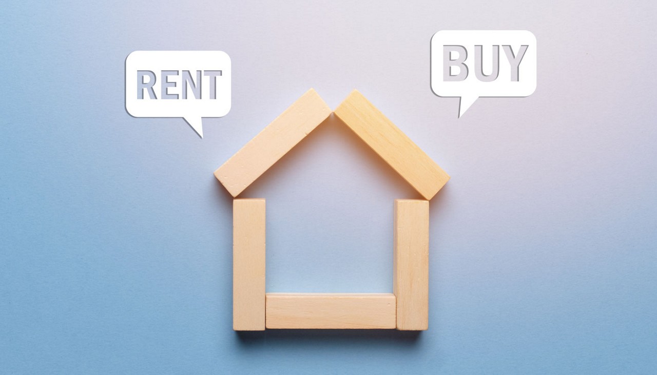 Concept of renting or buying real estate house made of wooden blocks with icons.